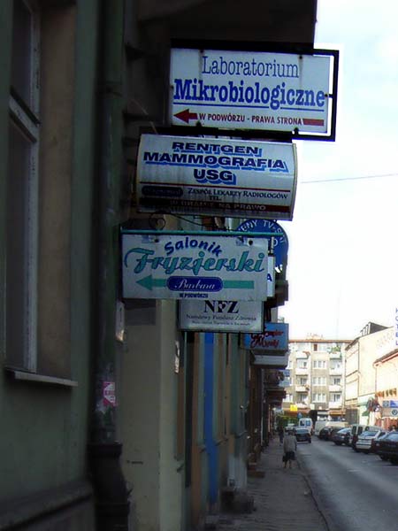  typografia stosowana szyldy labolatorium i fryzjera 